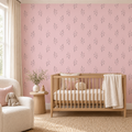 Blush botanical sprigs wallpaper with original larger print in a nursery