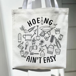 Hoeing aint easy Funny Tote Bag Gift Idea Trendy Gardener Gift Nature Eco friendly Grocery Bag Farmer Market Library Bag Plant Lover Reusabl