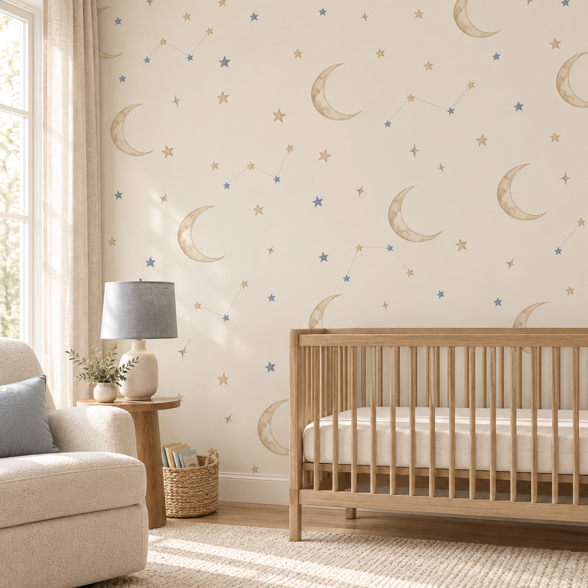 Oatmeal crescent moons and dusty blue stars wallpaper in a neutral nursery with an oak crib