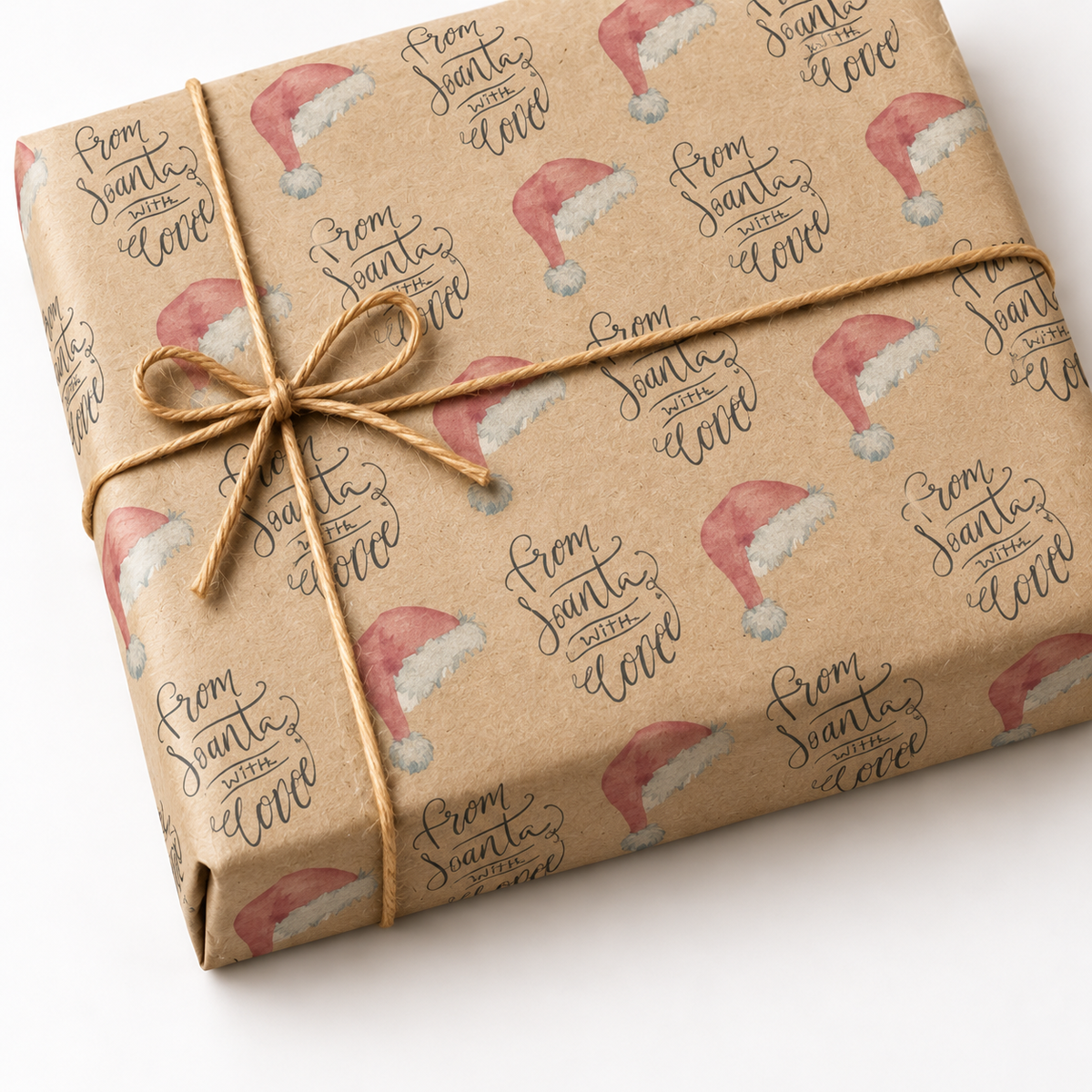 From Santa Gift Wrap on a kraft wrapped gift with jute twine