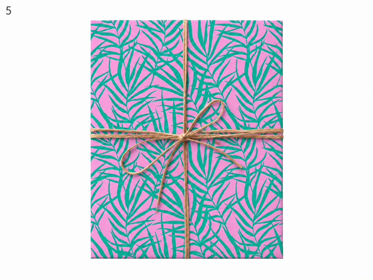 bright pink tropical palms gift wrap tied with twine