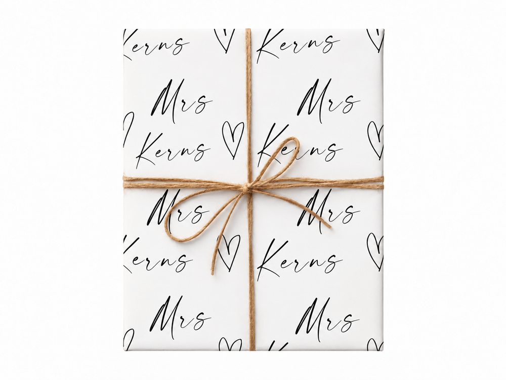 personalized mrs name wrapping paper gift tied with twine