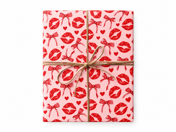 Red Kisses Hearts and Bows Wrapping Paper gift tied with twine