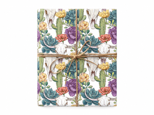 Western Cactus Skull and Floral Wrapping Paper gift tied with twine